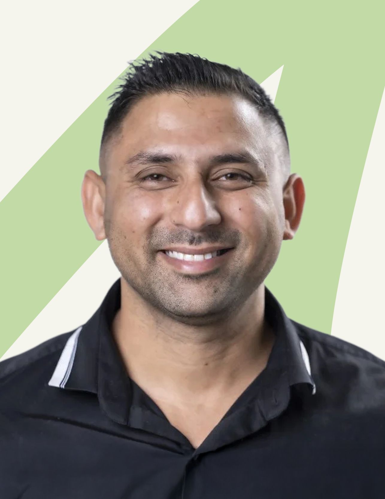 Prince Singh, founder of NewPath, smiling in a black shirt